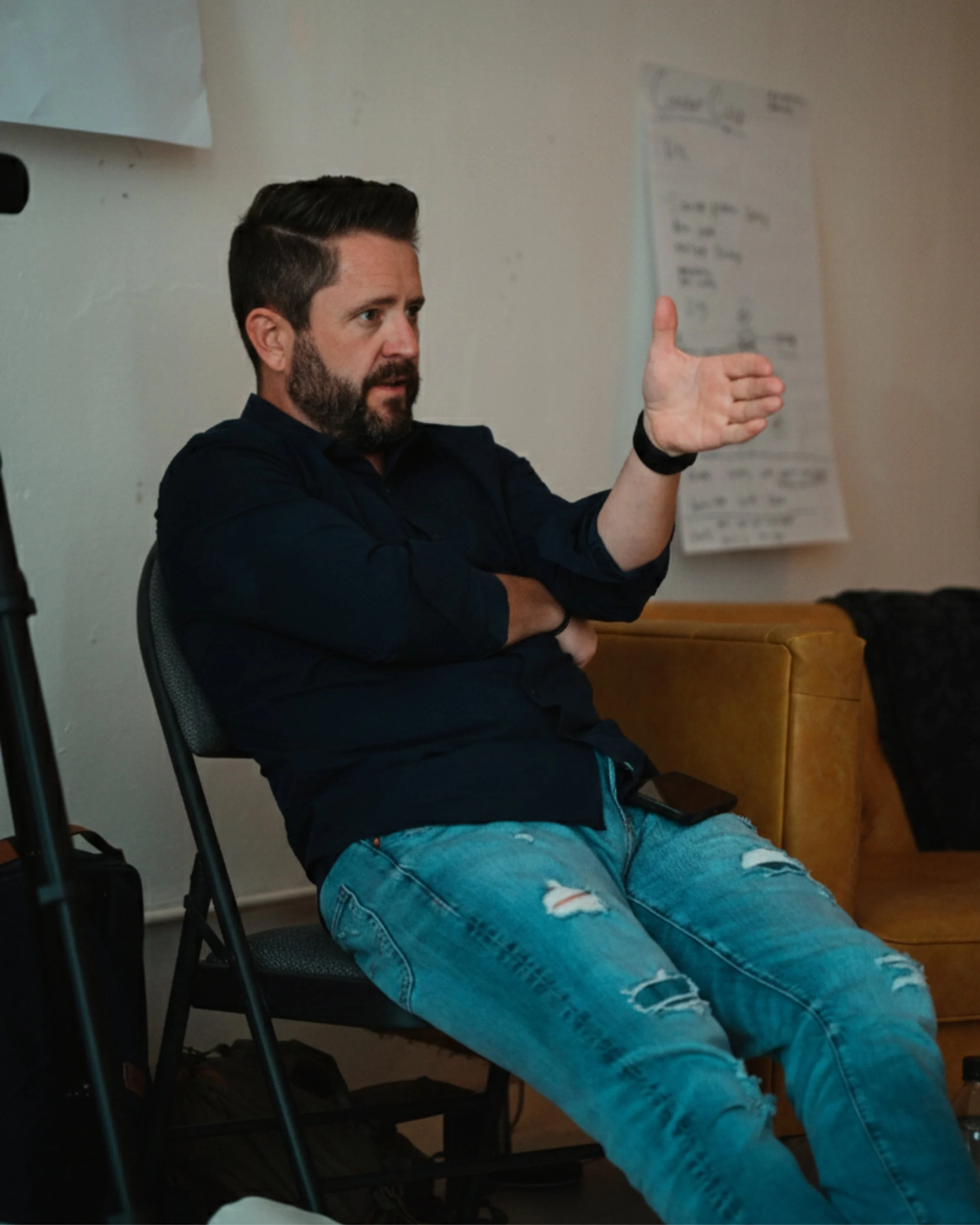 Wayne Salmans teaching at a flip chart